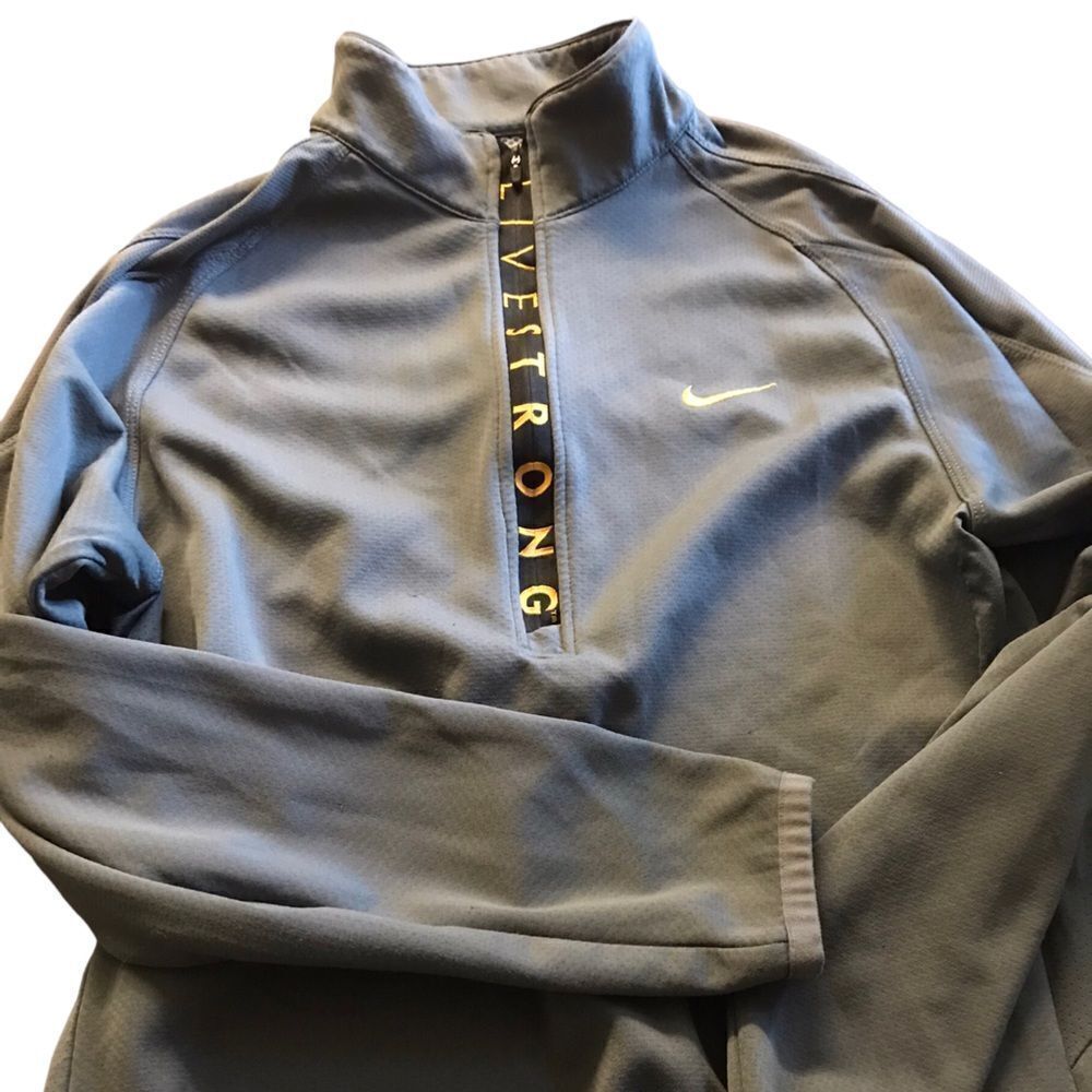 Nike ladies size small livestrong size small pullover excellent condition